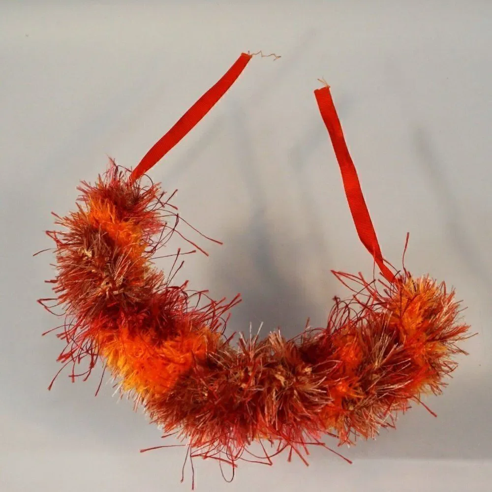 Kupee Wrist Lei Pair Red Orange Eyelash Yarn Tie-Ribbon
